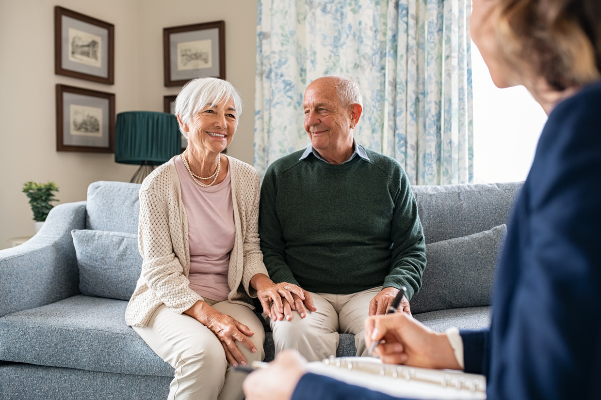 Social Worker Visiting Seniors at Home