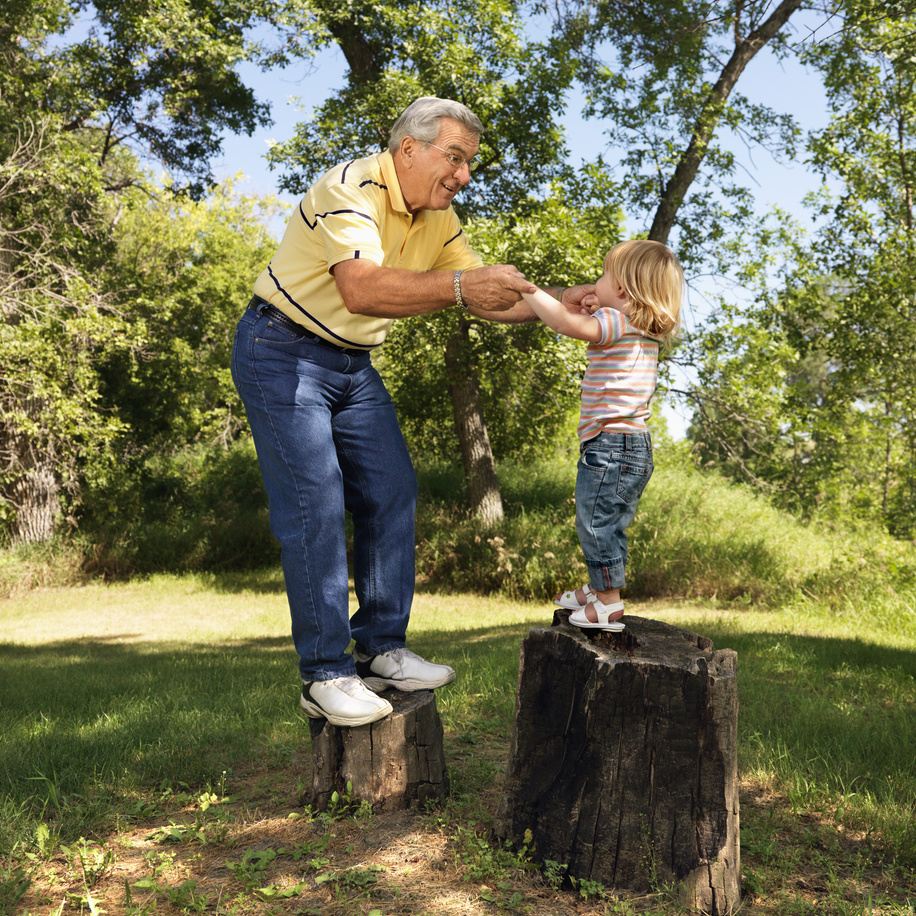 Senior Man and Child Playing 